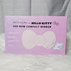IMPRESSIONS FOR HELLO KITTY pink compact LED bow mirror